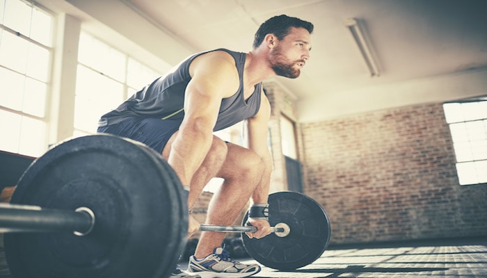 Man weightlifting at the gym | DNAfit Blog