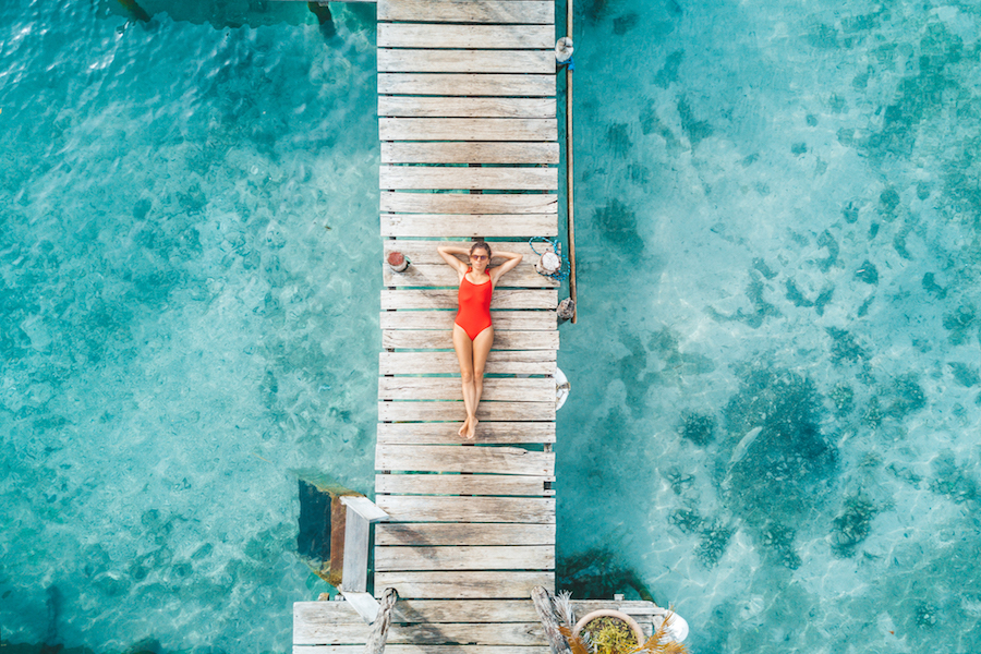 Woman relaxing on vacation | DNAfit Blog