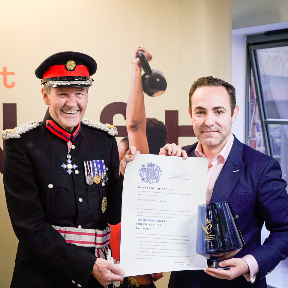 Deputy Lieutenant Sir Ian Johnston presenting the awards to Avi Lasarow, co-founder and CEO of DNAfit on behalf of The Queen.